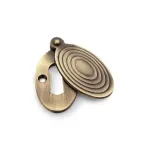 Alexander and Wilks Ellipse Escutcheon with Christoph Design Cover - Antique Brass