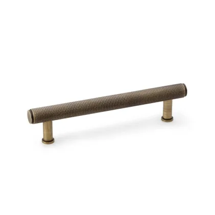 128mm Alexander and Wilks Crispin Knurled T-bar Cupboard Pull Handle - Antique Brass